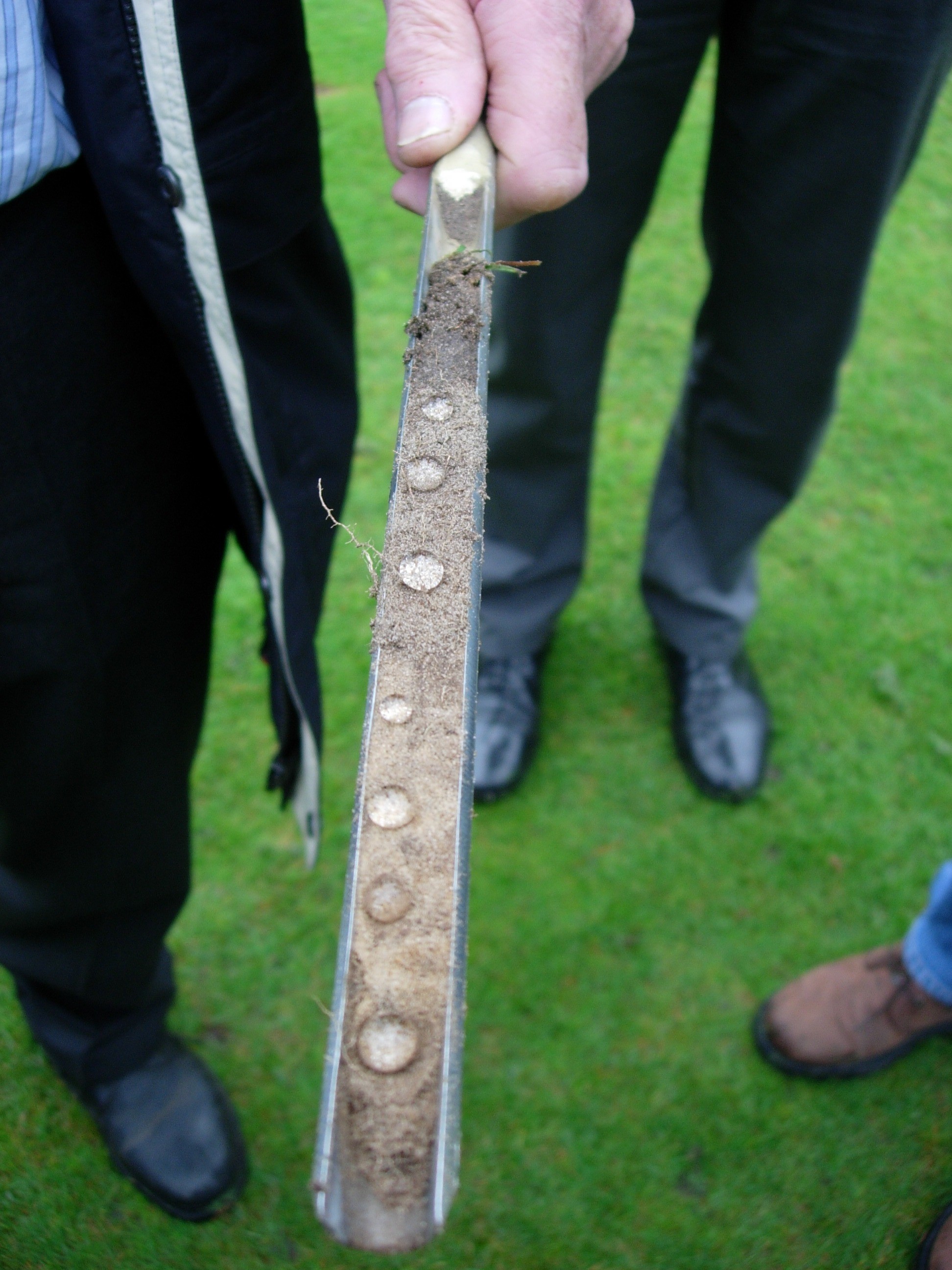 picture of soil sample showing water droplets on top